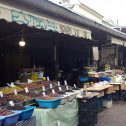 ATHENS, GREECE - November 20: Street market with olives, fresh fruits and vegetables in downtown Athens, Greece